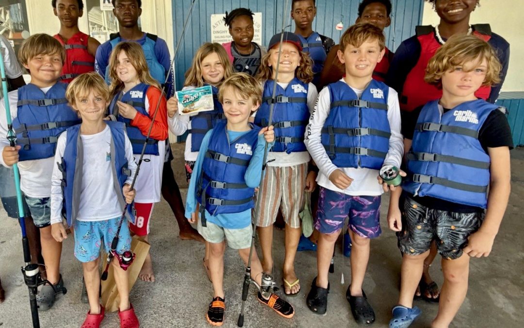 The Smiles Say It All as Young Sailors Enjoy Christmas Fun on the Water at AYC